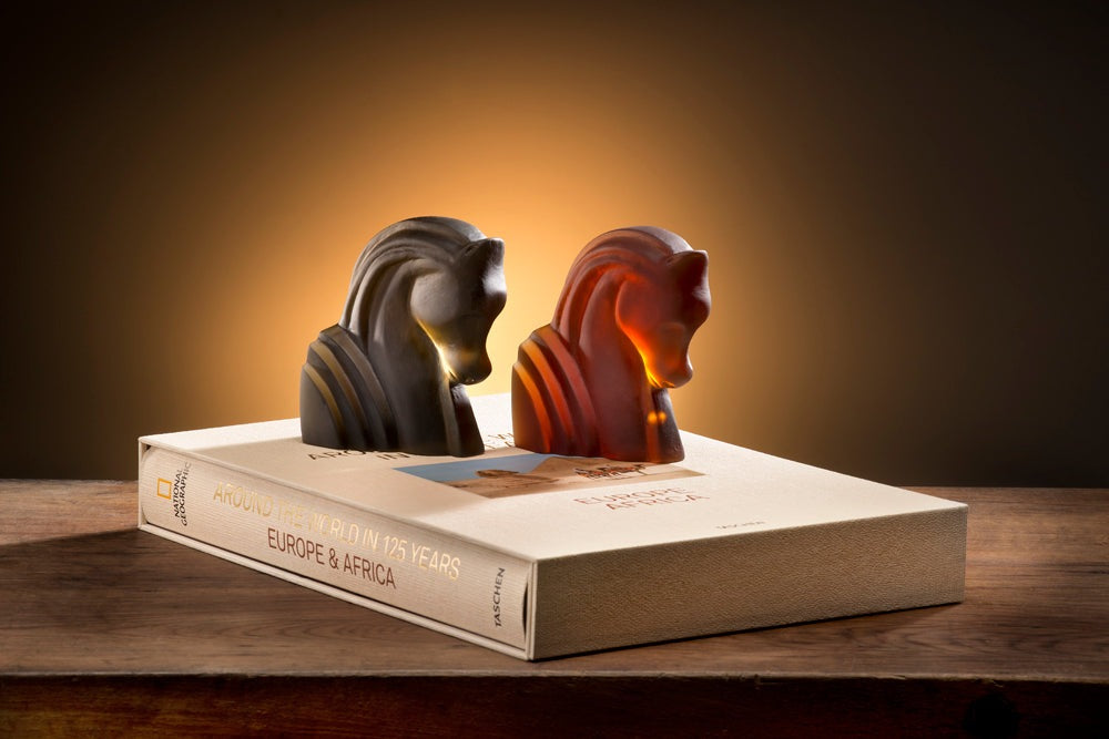 Hydra Horse Cast Glass Sculpture Olive and Amber on a book
