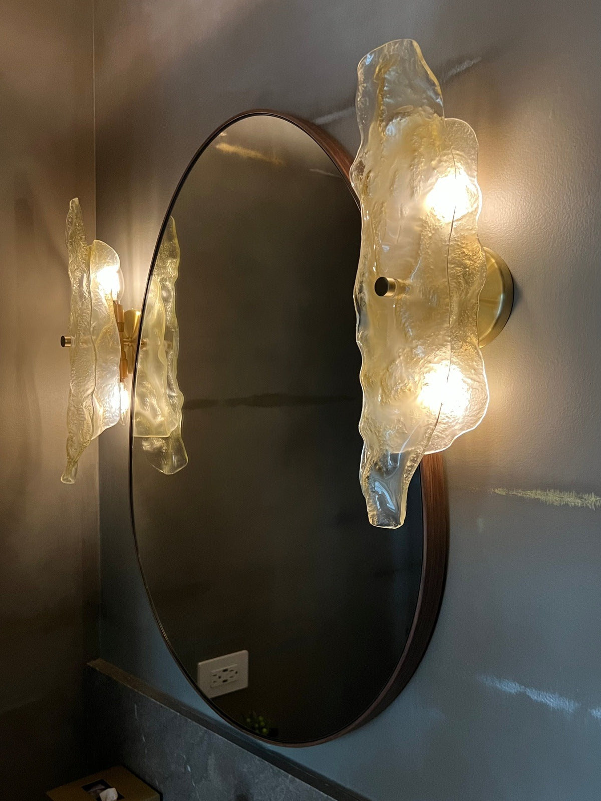 Dancer wall sconce with lights on