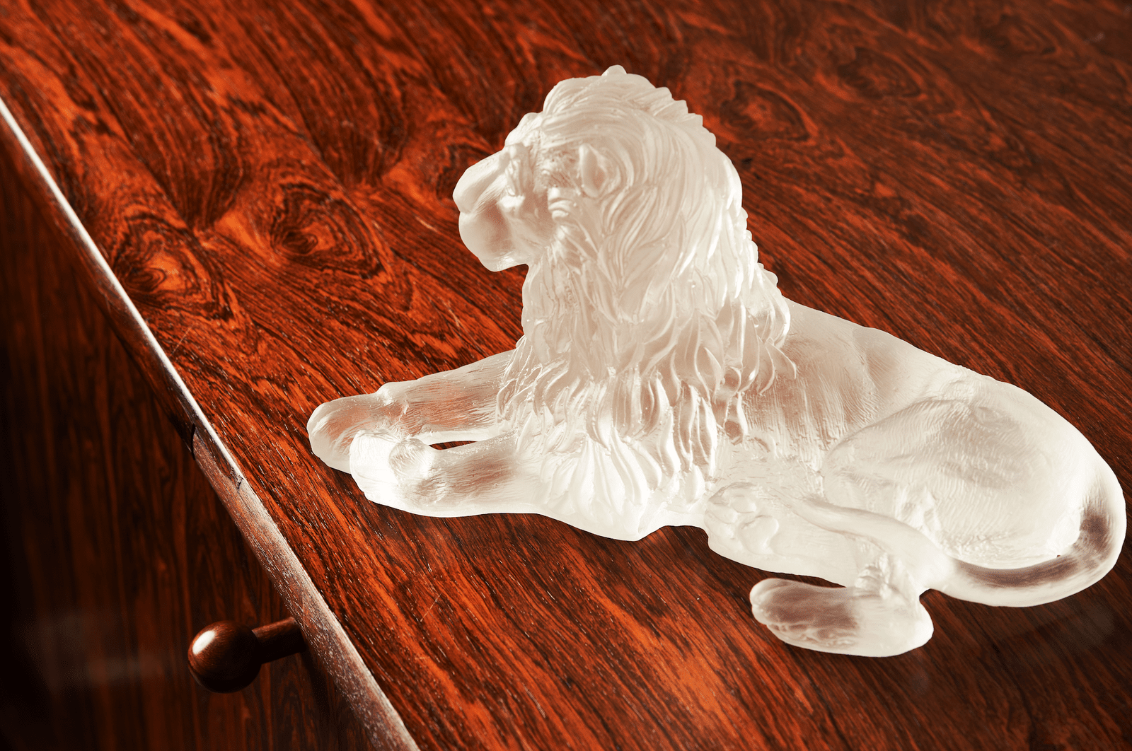 Lion Premium Glass Sculpture Ice on wooden table