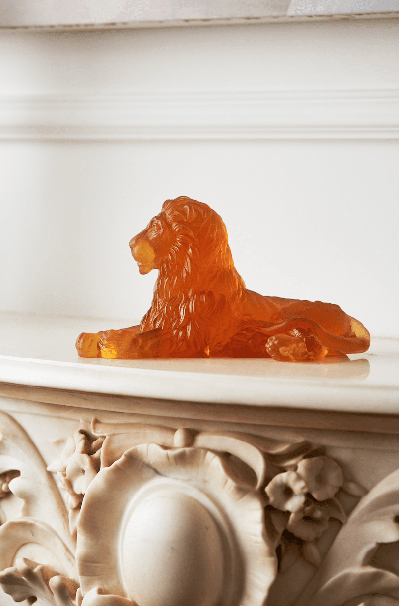 Lion Premium Glass Sculpture Amber on marble