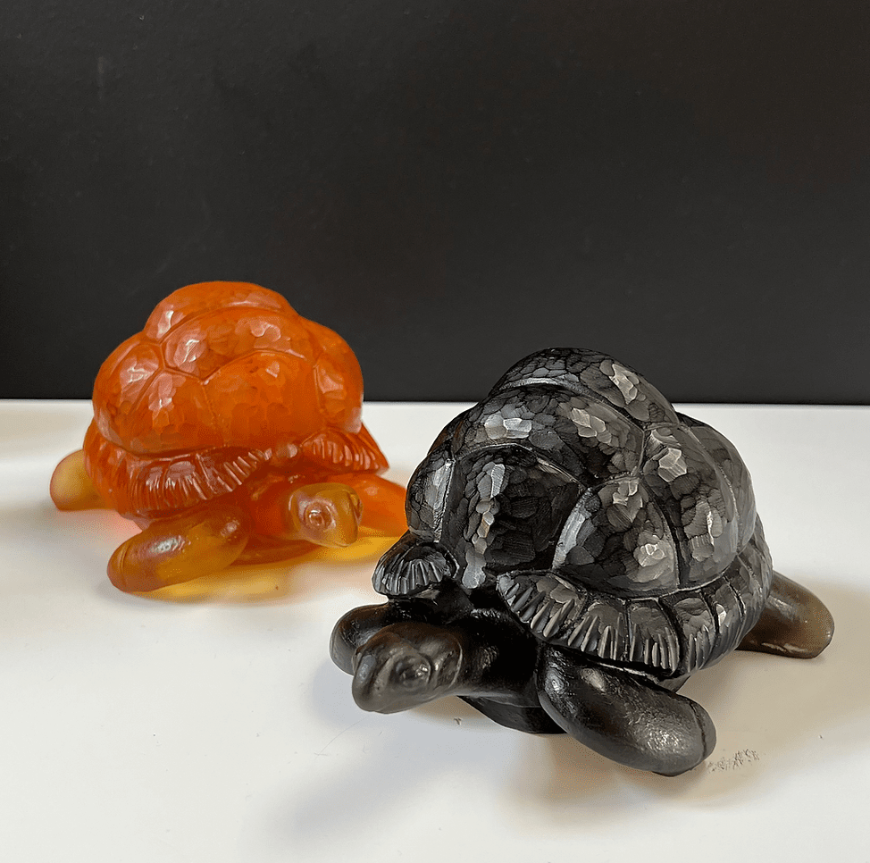 Tortoise Cast Glass Sculptures Amber and Black on b/w background