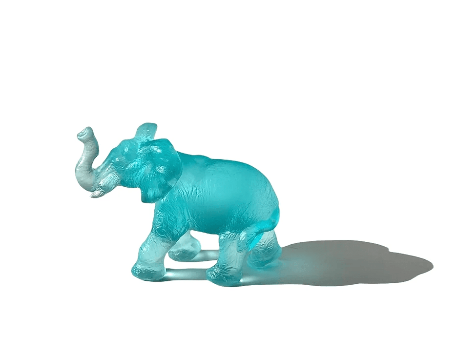 Baby Quanza Glass Sculpture Turquoise on white background